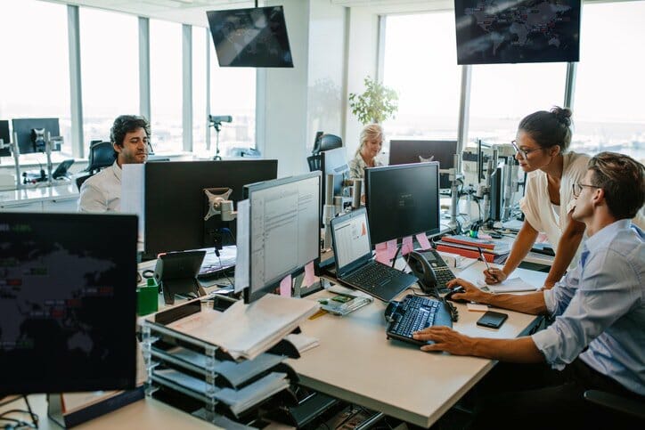 team working on computer 1
